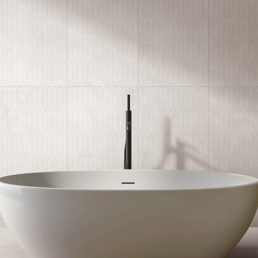 Venice Bianco 600x1200mm Matt 3D Capsule feature tiles behind a freestanding bathtub