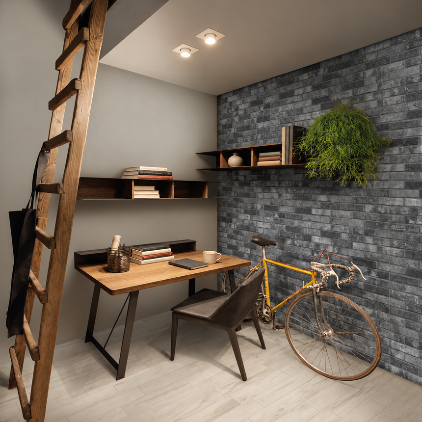 AI-styled office with London Brick Charcoal 60x250mm brick-look porcelain wall tiles, a timber desk and bicycle