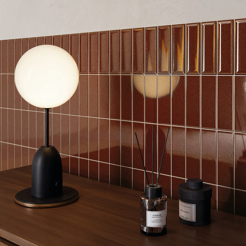 Console detail with Micare Saffron Dark flat wall tiles and a glossy Rim Saffron Dark border.