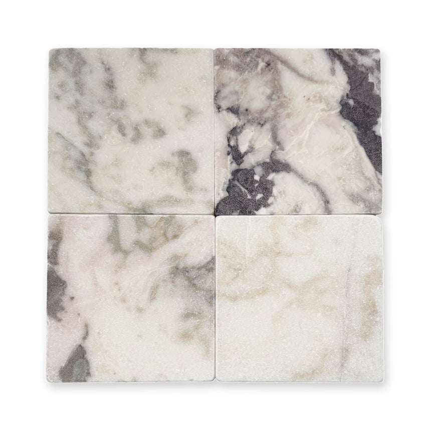 Viola Tumbled 150x150mm Natural Marble Square Tile — original supplier variation photo, neutral background and soft shadow; stone unchanged
