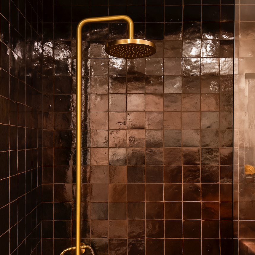 Zellige Marron hand made tiles on wall with gold shower head
