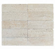 A natural travertine subway tile in beige colour, with rectangular subway shapes arranged in a grid pattern.