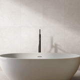 Venice Bianco 600x1200mm Matt 3D Capsule feature tiles behind a freestanding bathtub