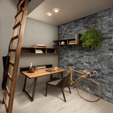 AI-styled office with London Brick Charcoal 60x250mm brick-look porcelain wall tiles, a timber desk and bicycle