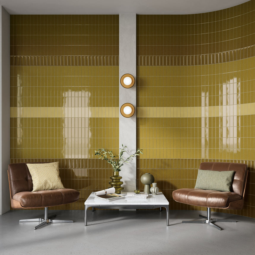 Living room feature wall mixing Micare Alpi Light, Medium and Dark tiles with Rim Alpi Dark borders.