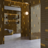 Bathroom wall combining Micare Ambar Dark with Ambar Light accents and Canale Ambar Dark relief tiles.