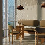 Cafe interior with a mix of Micare Linen Light, Medium and Dark tiles on the wall and floor.
