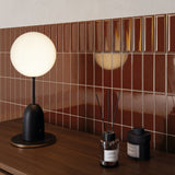 Console detail with Micare Saffron Dark flat wall tiles and a glossy Rim Saffron Dark border.