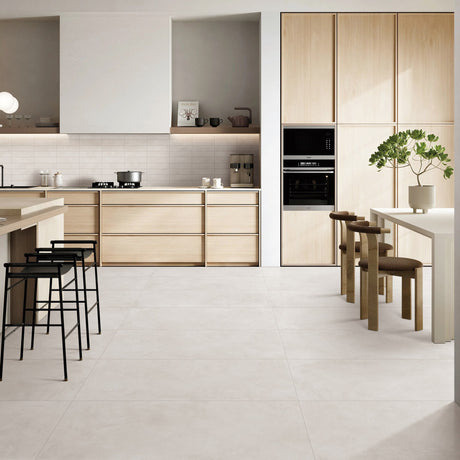 Venice Bianco 600x1200mm Matt concrete look floor tiles in a light timber kitchen