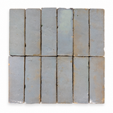 Zellige Bejmat Sky Blue 50x150mm Gloss Hand Made Moroccan Tile showing tile variation
